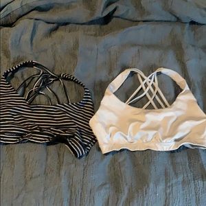 Two Victoria’s Secret sports bras, size medium